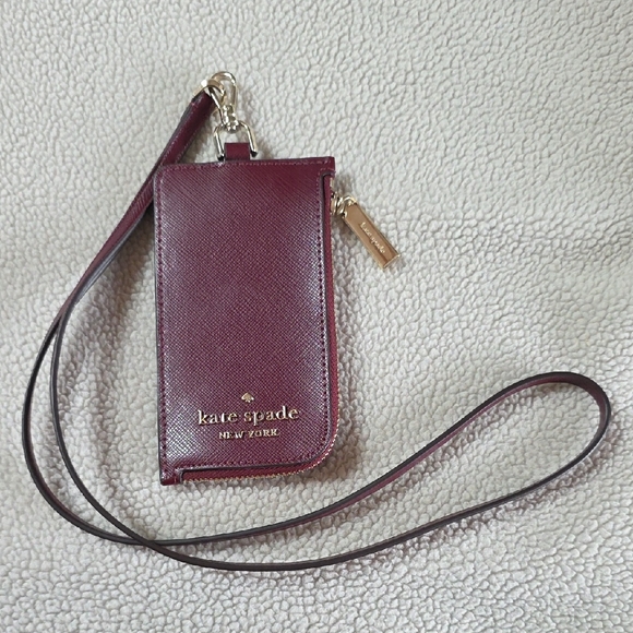 kate spade Handbags - Kate Spade Maroon Wristlet
